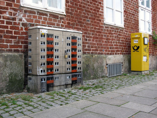 Illustration for article titled Artist Converts Everyday Objects Into Super-Realistic Miniature Apartment Buildings